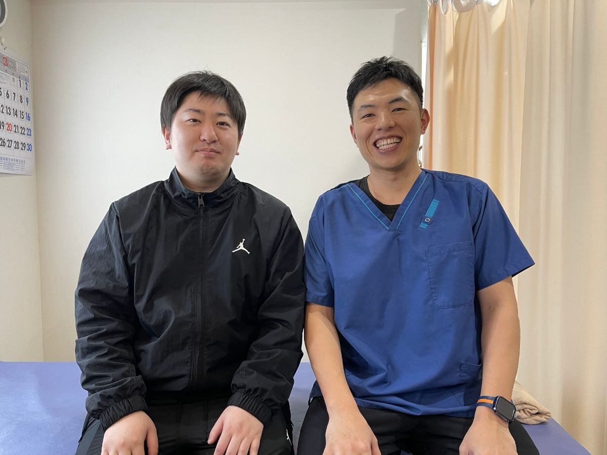 ダイナフィットを体験された男性とスタッフ